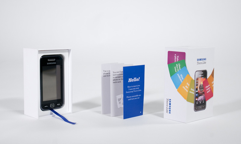 A phone box and manual are shown as a product shot